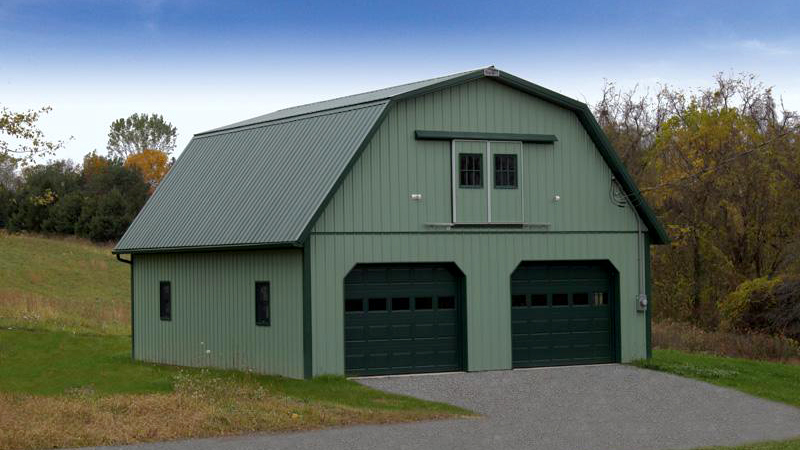 barn style two overhead door green building