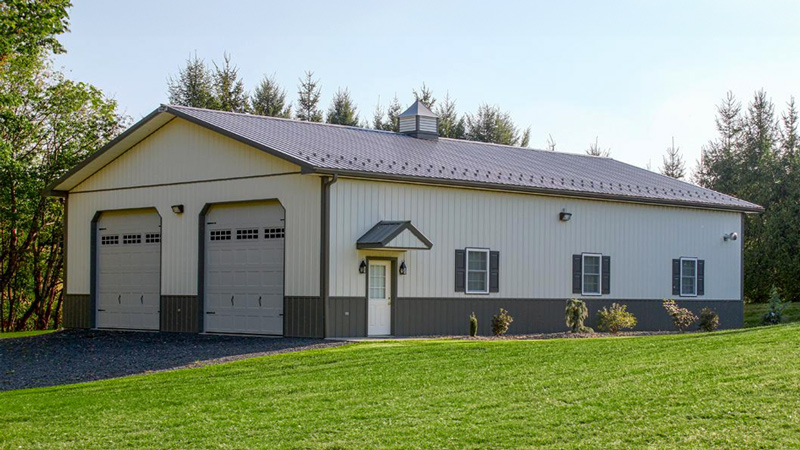 two garage door building with brown and white