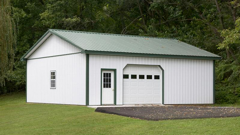 single overhead door white and green trim building