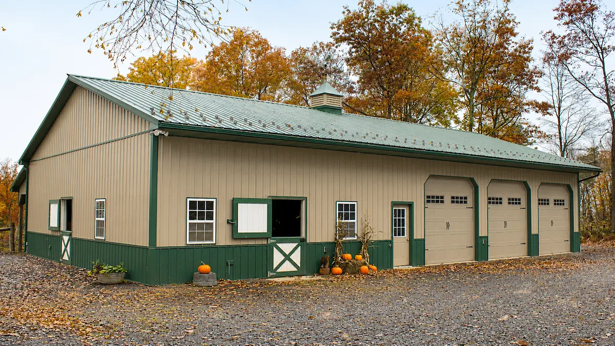 40x68 Clay Agricultural Barn with Carriage Style Doors, Cupola, Snow Guards, and Evergreen Roof