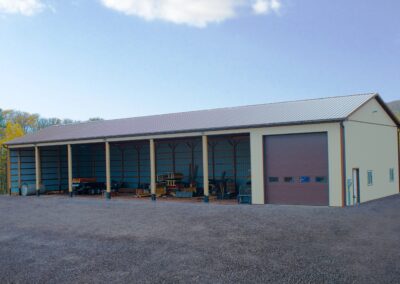 Agricultural pole barn with 7 bays, tan siding and brown roof