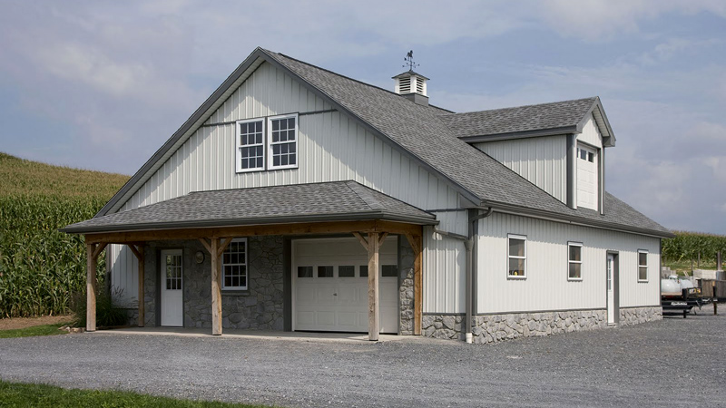 gray and white pole building