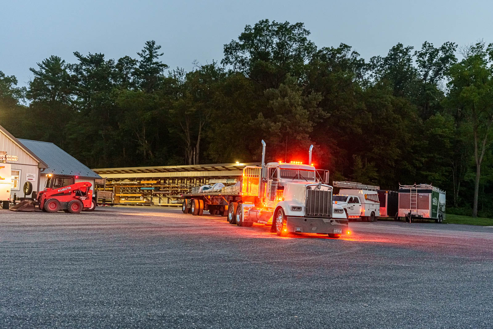 overhead view of work trailer being loaded by forklift 