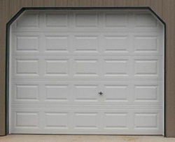 overhead door with raised panel and no windows