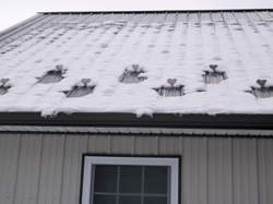 closeup of roof with snow on it