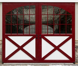 red and white sliding door with windows and crossbucks