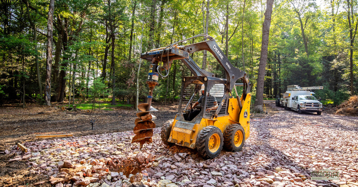 augering-pole-barn-site- augering post holes, compact site excavation, pole barn site preparation, ground post setting