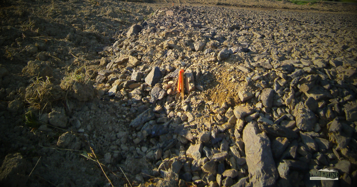 improper-fill-shale-site-preparation marking utility lines, excavation safety, build zone markers, site prep layout, construction area staked