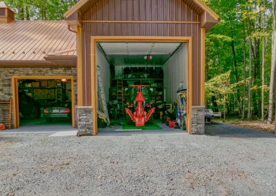 28'x40'x10' Pole Building - attached 16'x36'x14', Reverse Gable (valley) attachment for boat storage