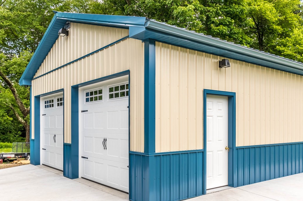 Blue Gutter Color Match on Metal Building Blue rain gutter matching the trim and roof color on a metal pole building