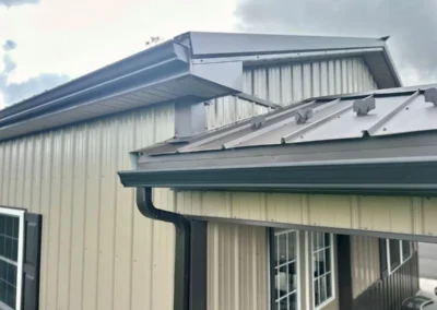 Roof and gutter system on a pole building