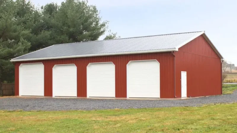 Large overhead doors on farm pole barn allowing tractor and truck access