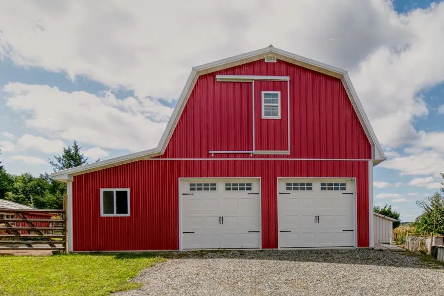 High Eave Height Pole Barn for Agricultural Equipment Storage Tall red agricultural pole barn with increased eave height