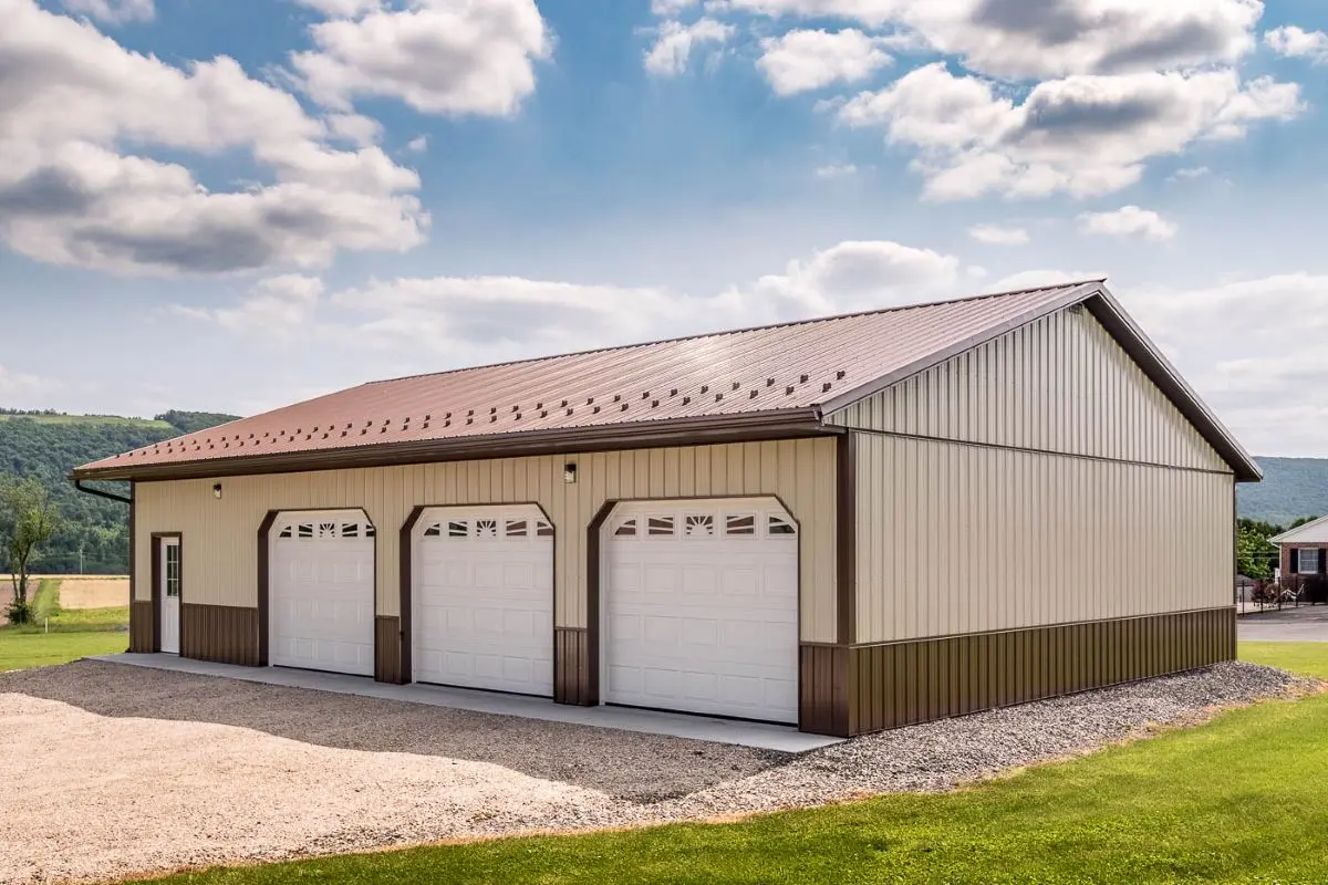 Pole barn garage exterior with multiple doors and custom design features