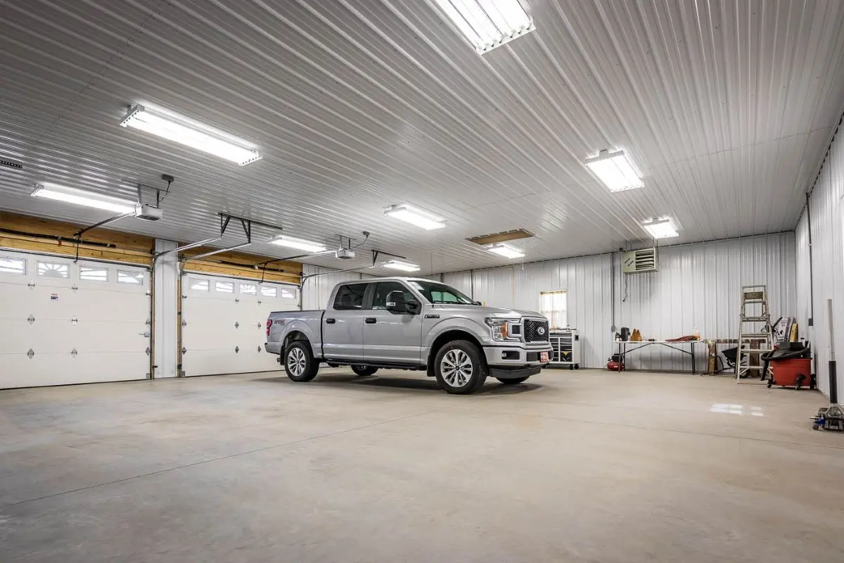 Garage interior showing lighting, ceiling finish, and open layout