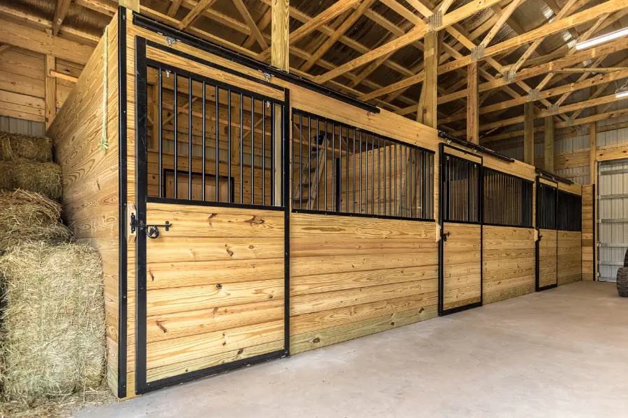 Timberline equine pole building with the horse stalls and grooming bay
