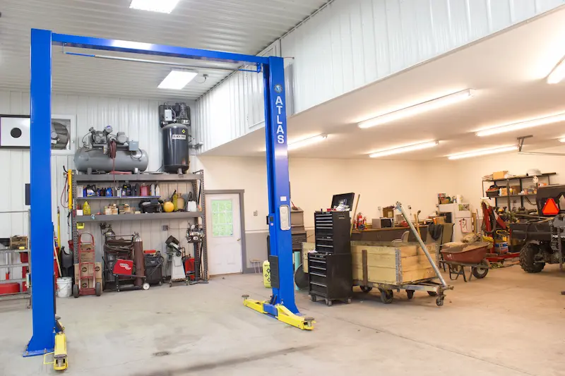 workshop area for farm maintenance Workshop area with tools and lift