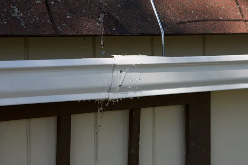 leaking gutter showing how maintenance impacts how long pole barns last in Pennsylvania
