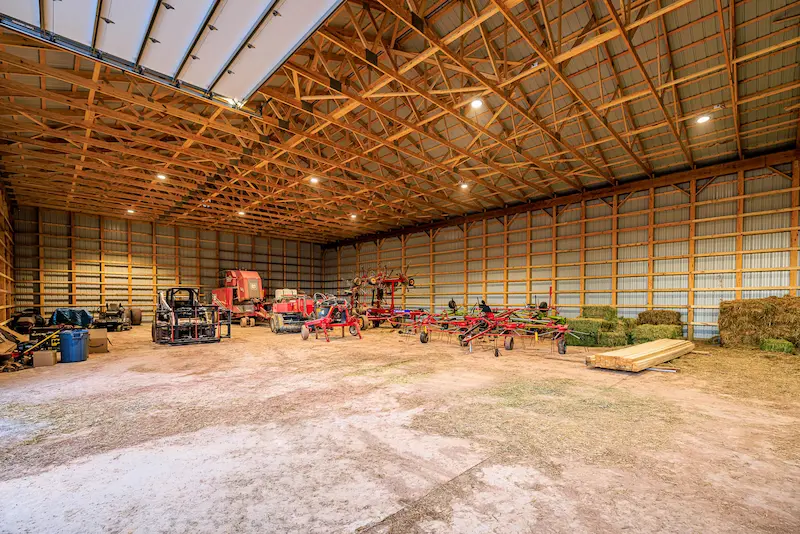 Large open interior space inside a post-frame pole building used for agricultural storage in Pennsylvania